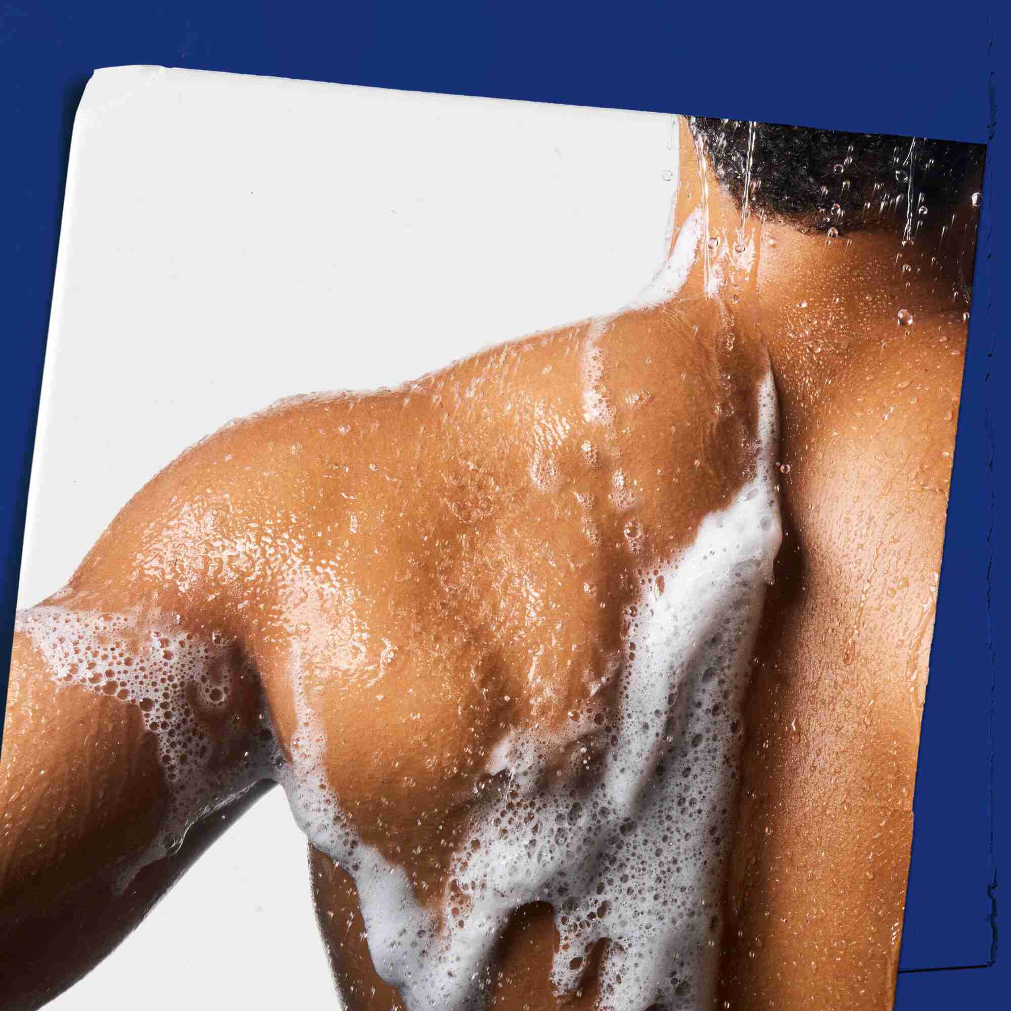 Body Fuel All-In-One Energizing Wash lathered on skin, demonstrating its use.