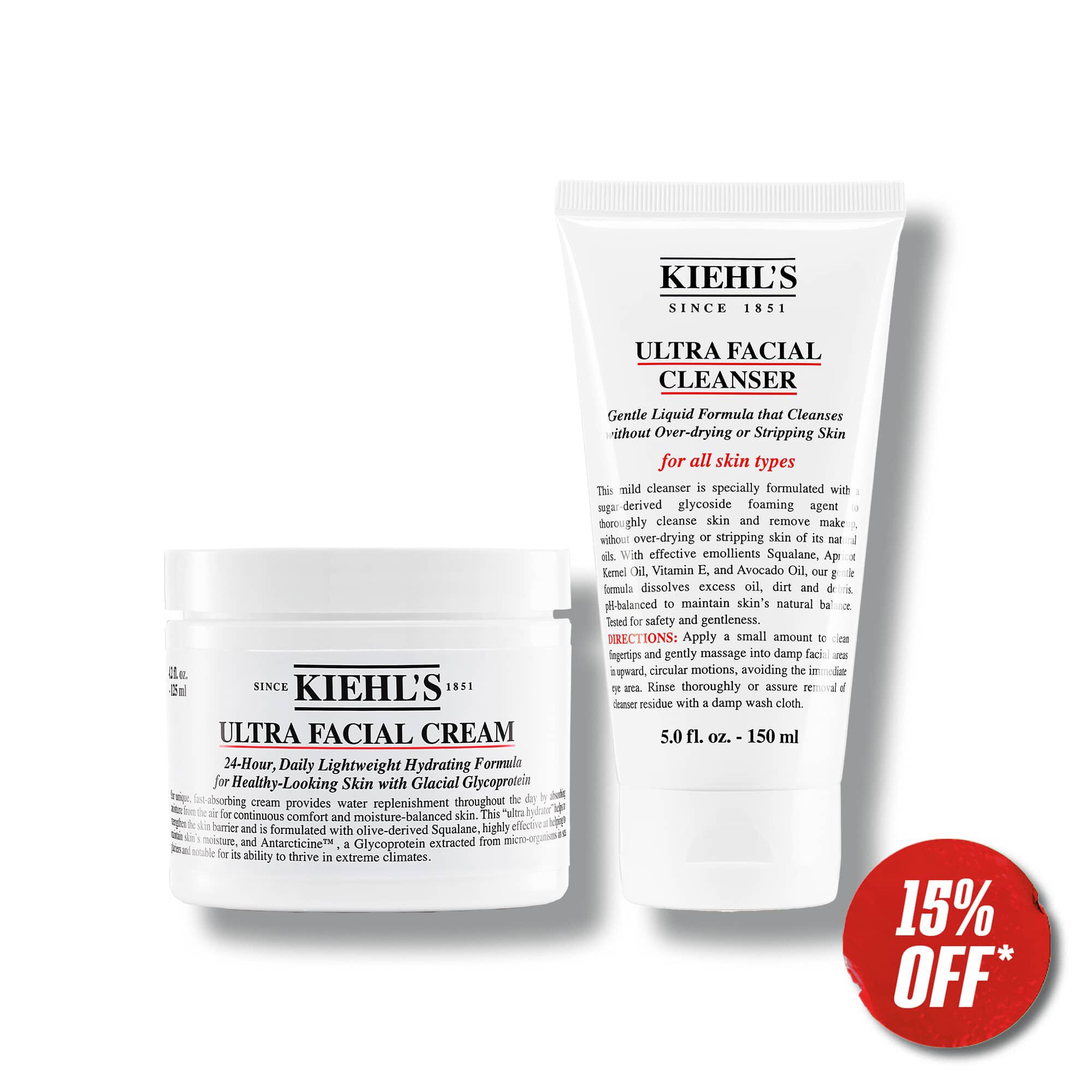 Kiehl's Ultra Facial Cream and Ultra Facial Cleanser with a "15% OFF" promotion tag, showcasing skincare products for all skin types. Discount applies at cart. 