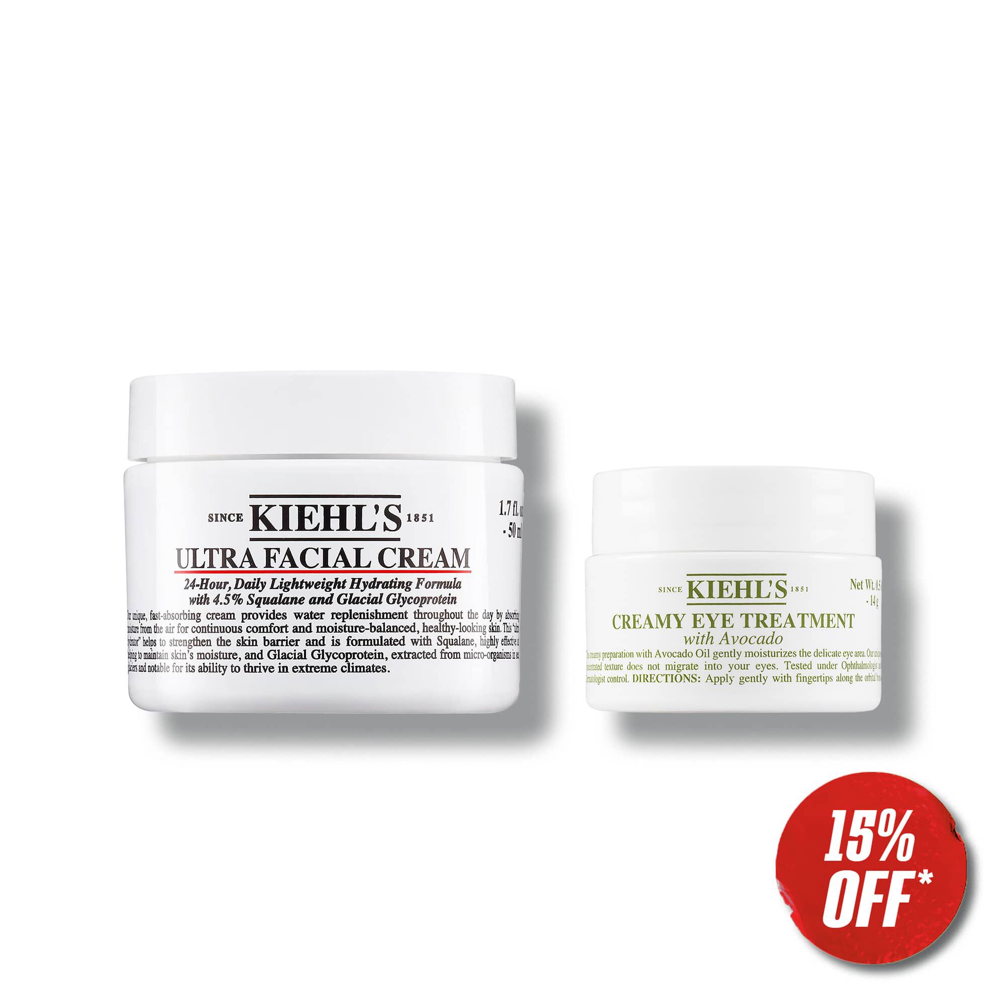 Two Kiehl's skincare products: Ultra Facial Cream and Creamy Eye Treatment with Avocado, with a red "15% OFF" promotional tag. Discount applied at cart.