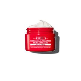 Red jar of Kiehl’s Ultra Facial Meltdown Recovery Cream Whip, showing a whipped cream texture.