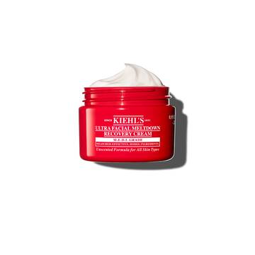 Red jar of Kiehl’s Ultra Facial Meltdown Recovery Cream Whip, showing a whipped cream texture.
