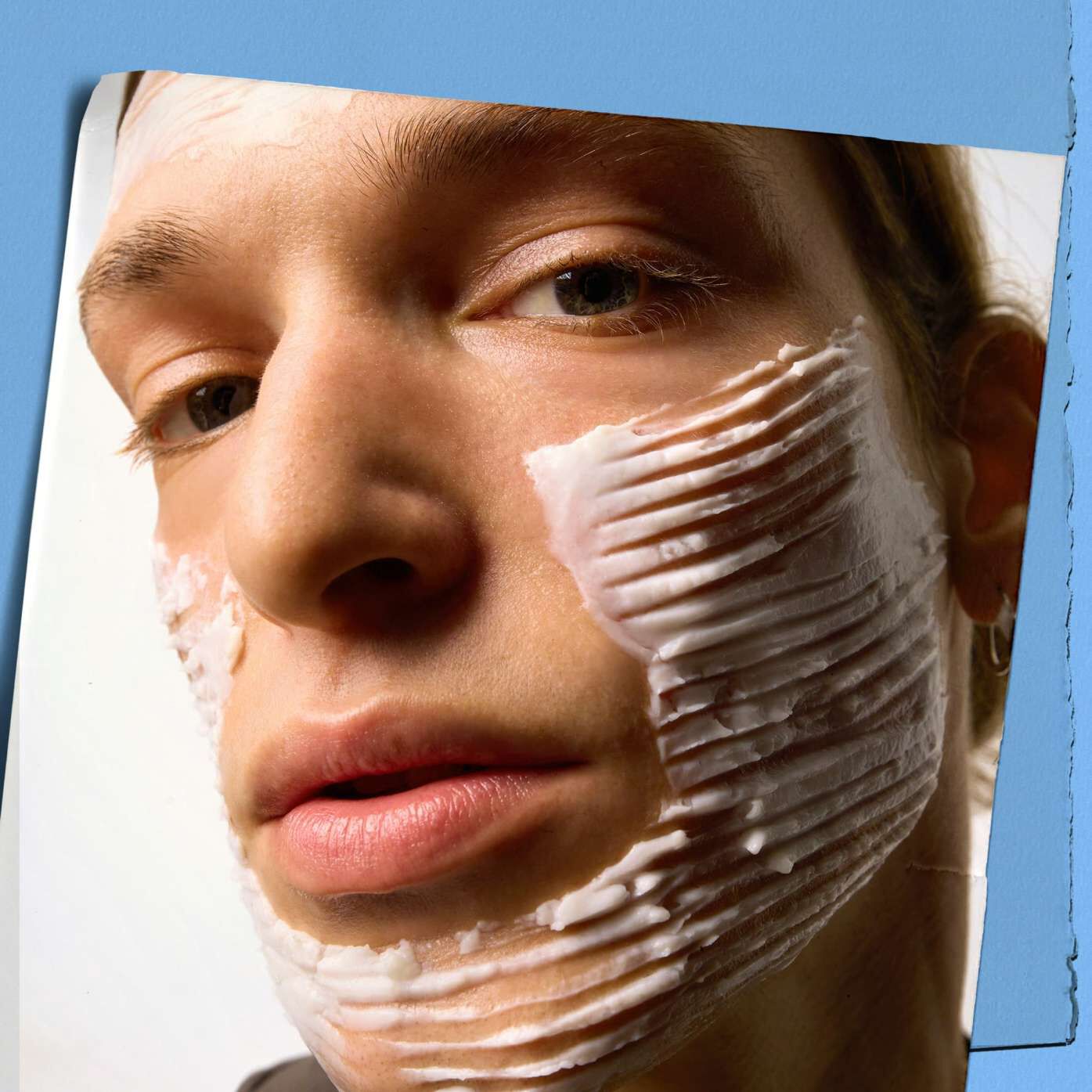Model with a texture sample of Kiehl's Ultra Facial Barrier Cream on their face