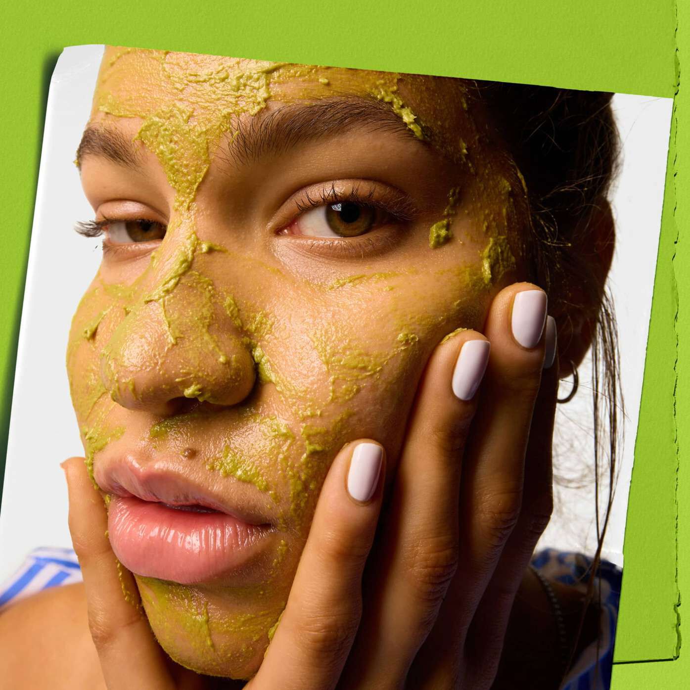Model using Kiehl's Avocado Nourishing Hydration Mask on their face