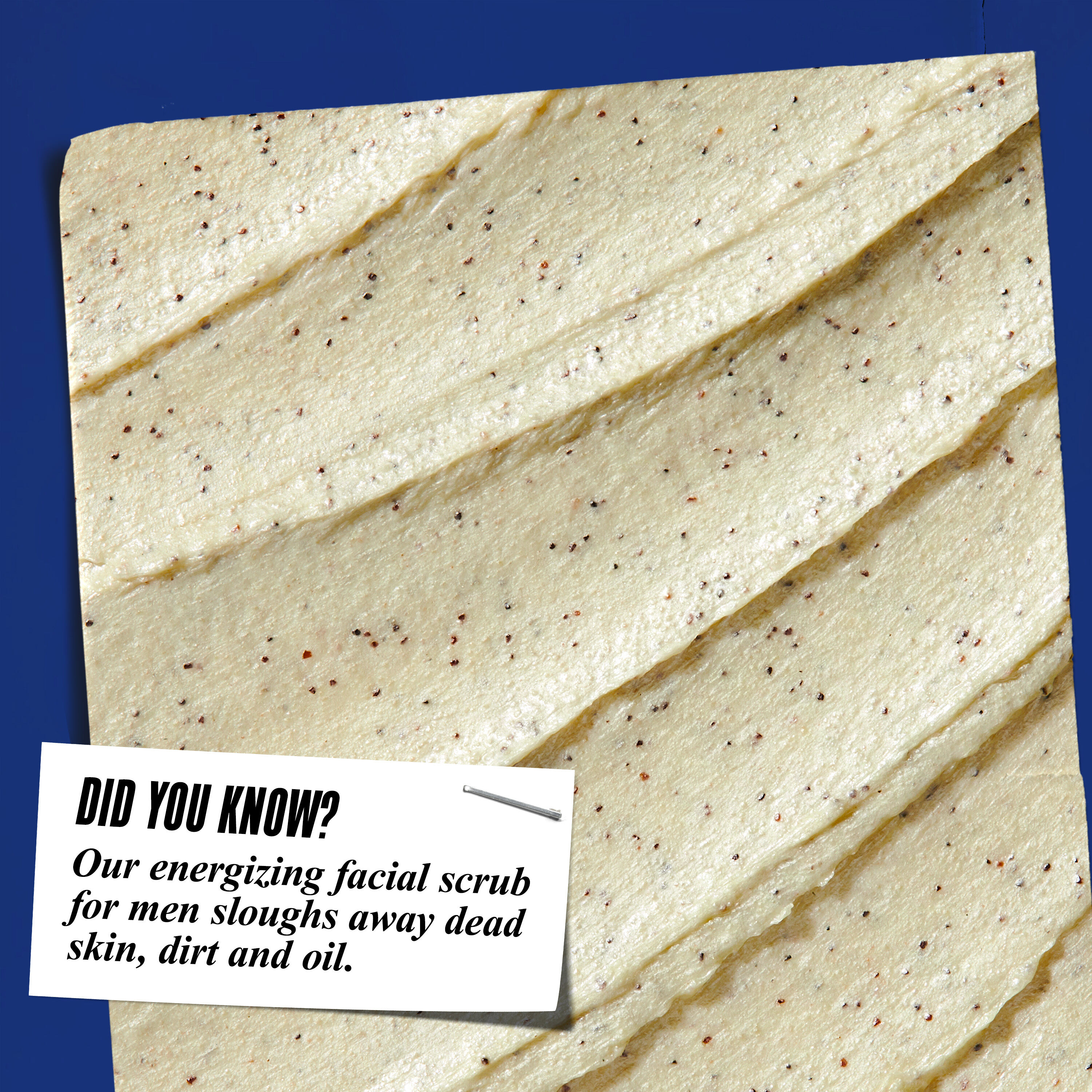 Close-up of Facial Fuel Energizing Scrub texture. Text reads: "Did You Know? Our energizing facial scrub for men sloughs away dead skin, dirt, and oil."