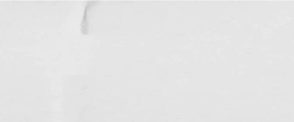 A minimalist design featuring a green circular shape on the left side of a white background, with a faint line and a subtle watermark on the right.