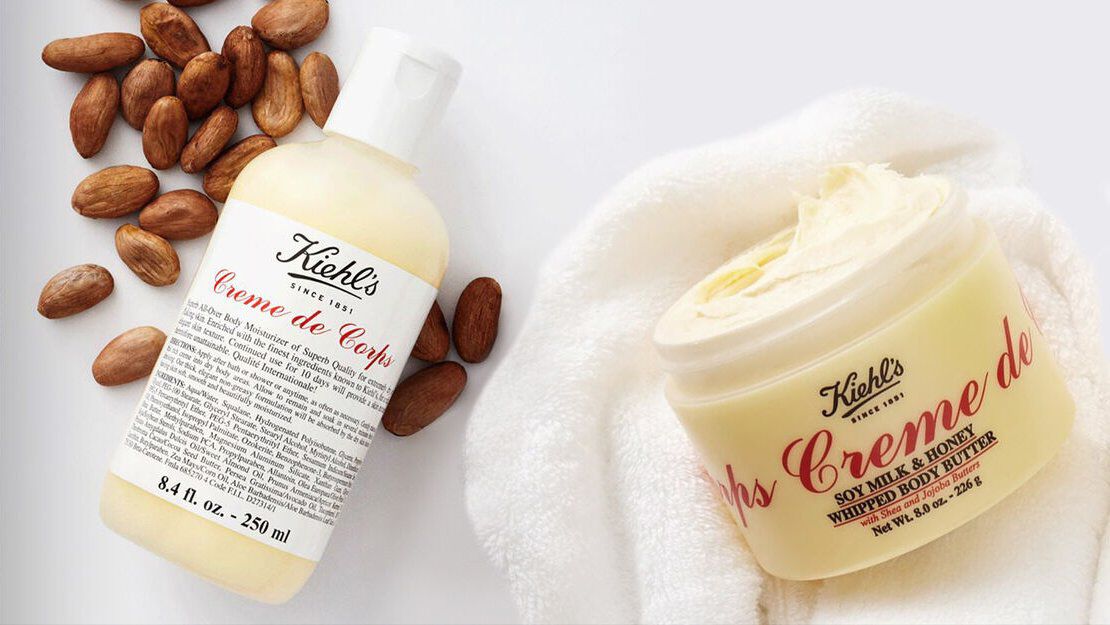 A product shot showing Kiehl’s Creme De Corps Body Lotion and Body Butter.