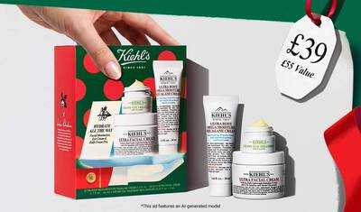 A Kiehl's holiday gift set featuring Ultra Facial Cream, Ultra Body Mega Moisture Squalane Cream, and Creamy Eye Treatment with Avocado, displayed with a festive price tag.​