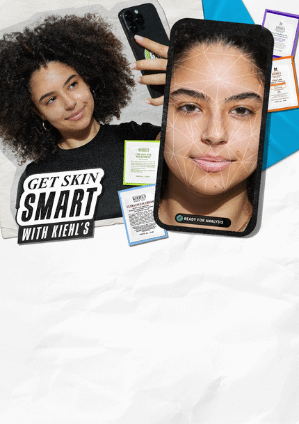 A split image featuring a woman with curly hair on the left, smiling and holding a smartphone, and a close-up of a woman's face on the right, overlaid with geometric lines, surrounded by colorful skincare product sheets. The text "Get Skin Smart with Kiehl's" is prominent at the bottom left.