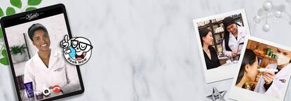 A digital tablet displays a smiling beauty consultant ready to assist, with "Book Now" highlighted. Two polaroid photos show a skincare consultation in progress, featuring a client and a professional applying treatments. The background features a marble design with scattered leaves.