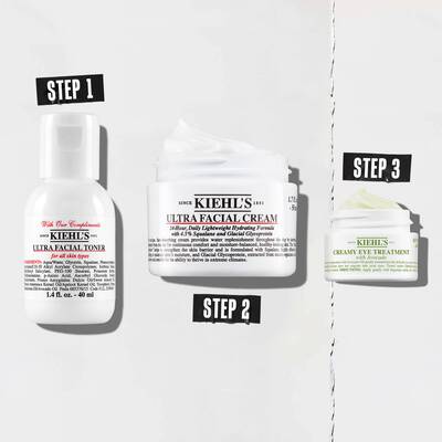 A group of Kiehl's skincare products included in bundle KIEB00001: Ultra Facial Cream 50ml (full size), Creamy Avocado Eye Treatment 14ml (full size), Ultra Facial Toner DLX (40ml).