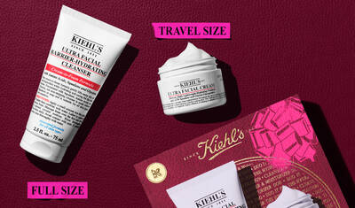 A graphic displaying a white "KIEHL'S ULTRA FACIAL BARRIER-HYDRATING CLEANSER" tube labeled "FULL SIZE" and a smaller white "KIEHL'S ULTRA FACIAL CREAM" jar labeled "TRAVEL SIZE". In the upper right, a pink splattered text box reads "VALUE $40". A partial Kiehl's gift box with a pink graphic bow is visible in the bottom right corner.