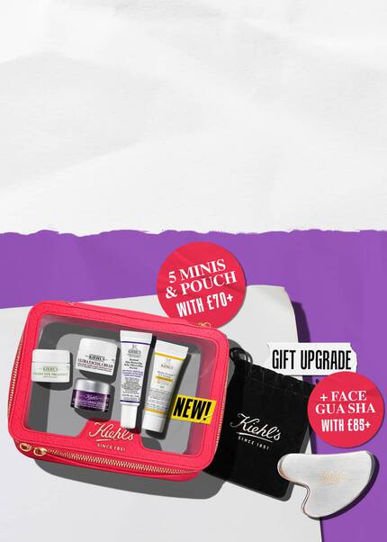 Purple banner featuring two gift offers: "5 MINIS & POUCH WITH £70+" and a "GIFT UPGRADE" including a "FACE GUA SHA WITH £85+". The image displays a red Kiehl's travel pouch with miniature products and a silver gua sha tool.