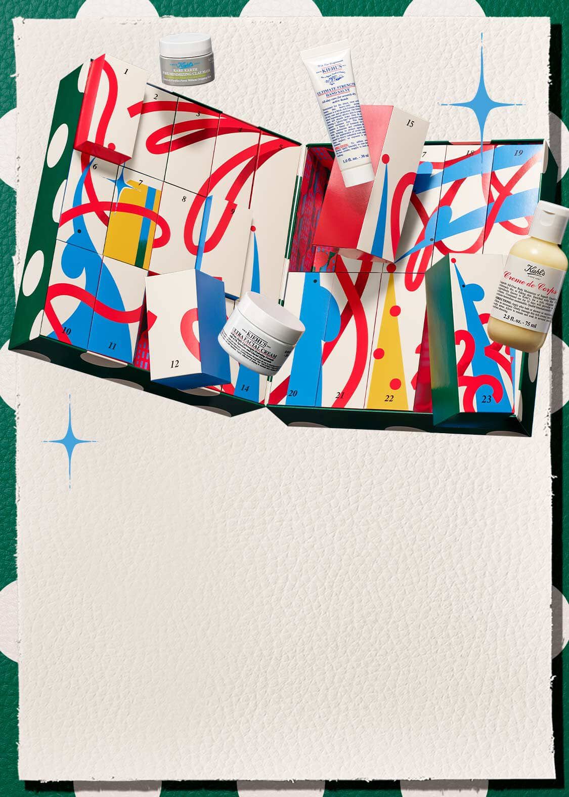 A festive mobile key visual for Kiehl's Holiday 2026 featuring an open advent calendar with colorful numbered drawers, holiday ribbons, and iconic skincare products including Ultra Facial Cream, Creme de Corps, and Ultimate Strength Hand Salve displayed against a festive green-and-white patterned background with blue sparkle accents.​