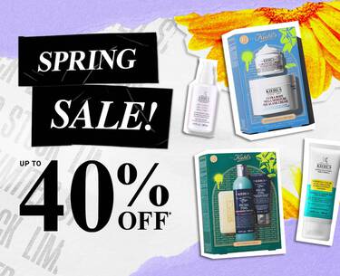 Promotional graphic for the Kiehl’s Spring Sale. Centered on the left is large, bold text reading ‘SPRING SALE!’ in white on black tape-style backgrounds, with ‘UP TO 40% OFF*’ in a classic serif font below. The background is a textured, light purple and white paper collage with a bright yellow flower in the corner. Scattered on the right are Kiehl's skincare products and gift sets, including the Ultra Facial Cream, Ultra Body Mega Moisture Squalane Cream, Facial Fuel Energizing Face Wash, and Expertly Clear Acne-Treating Lotion. The visual style is a modern, high-contrast collage with a mix of gritty 'street' elements and clean apothecary product shots.