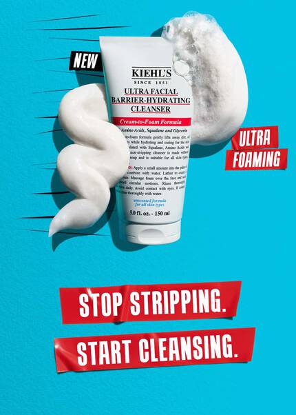 Kiehl's skincare products displaying a cleanser and two moisturizers, labeled "Cleanse," "Hydrate Face," and "Hydrate Body" on a bright blue background.