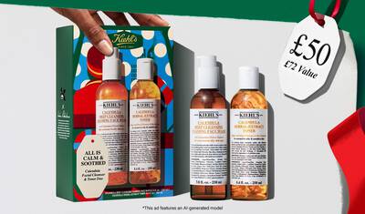 Hydrating Holiday Hits" skincare gift set on a green background, featuring Ultra Facial Cream and Creamy Eye Treatment with Avocado in festive packaging.​